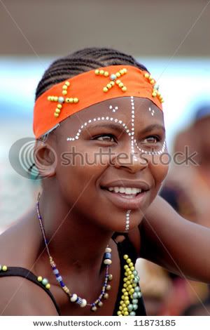stock-photo-outdoor-portrait-of-a-beautiful-black-woman-with-typical-traditional-african-painted-face-she-has-11873185.jpg
