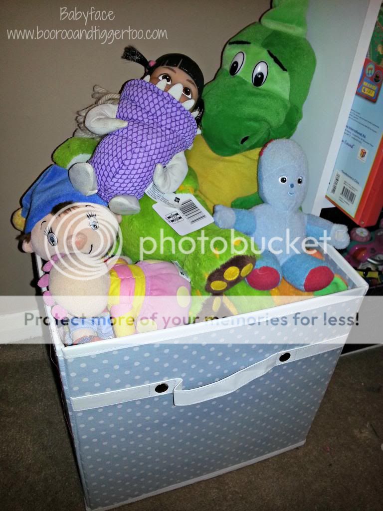 A group of stuffed animals in a box
