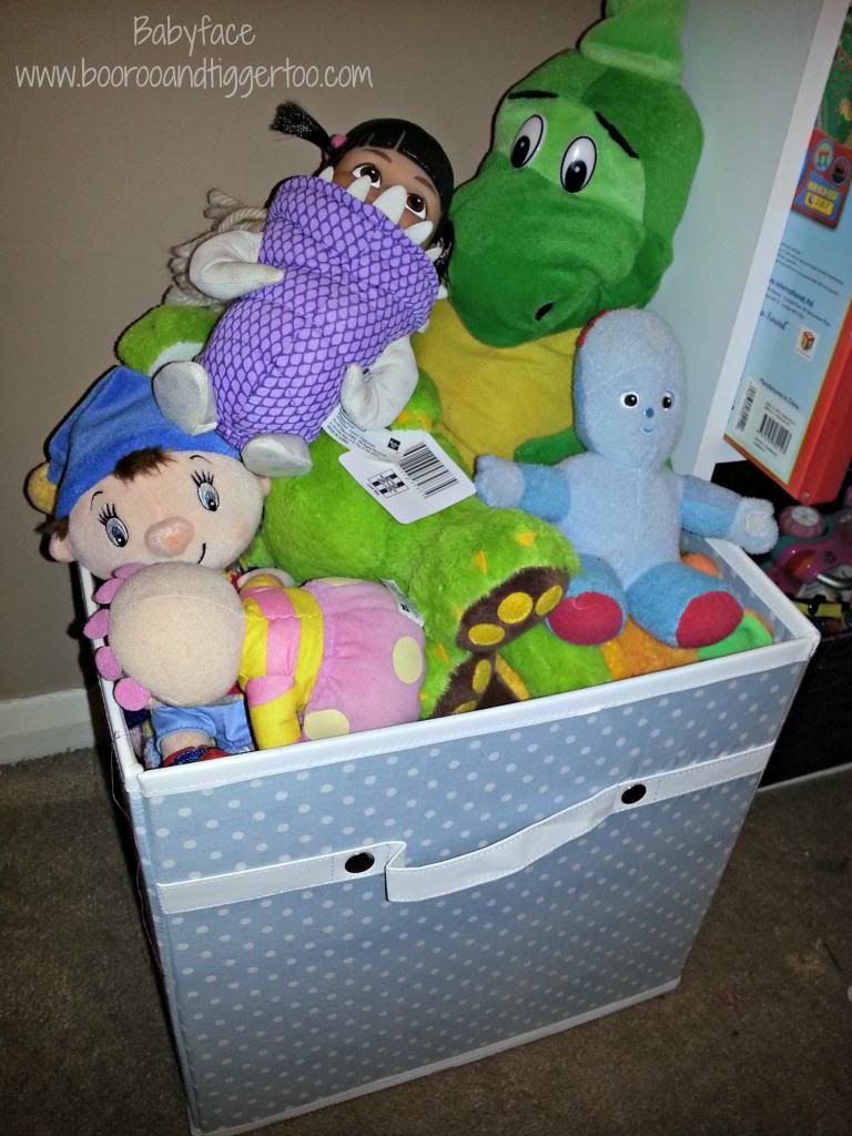 A group of stuffed animals in a box