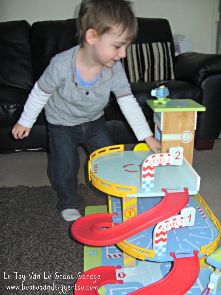 A small child sitting on a table