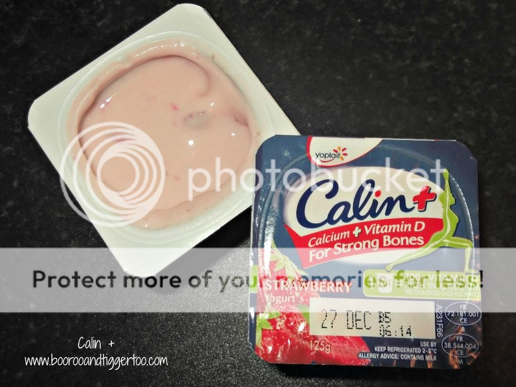 A plastic container of food, with Ice and Yoplait