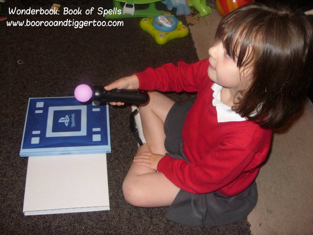 A young boy playing with a toy